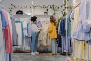 Women shopping at a clothing store that they found online through Google ads